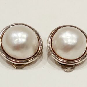 Mabe pearl clip on earrings set in silver