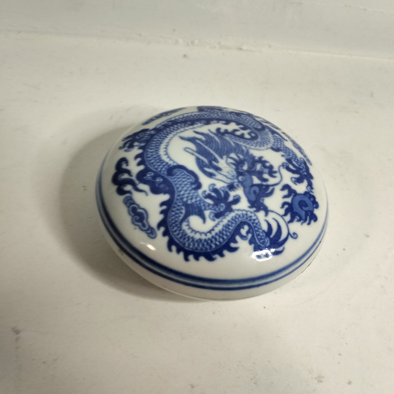 Chinese dragon porcelain ink paste container - Overstrand Hospice