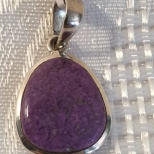 Sterling silver pendant with purple stone