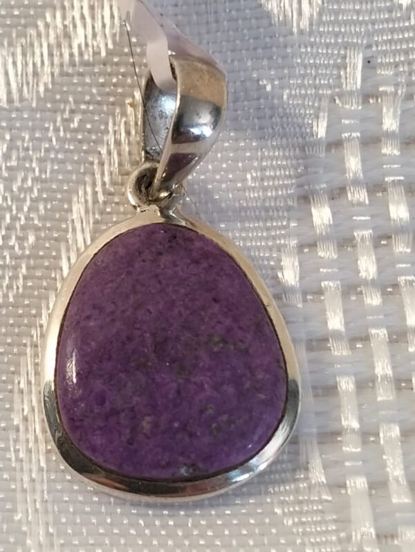 Sterling silver pendant with purple stone