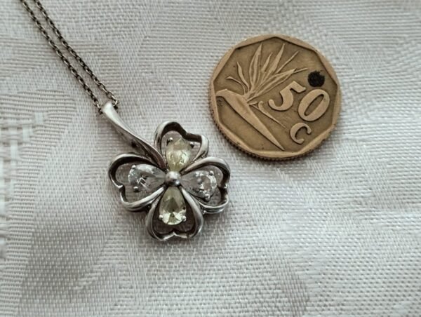 Sterling Silver Necklace with a Crystal and Yellow Crystal Flower Pendant - Image 3